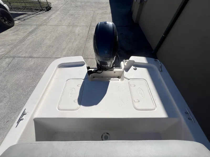 Slide: The Image of 2025 Carolina Skiff E 16 JVX boat with outboard motor, viewed from above. - 6