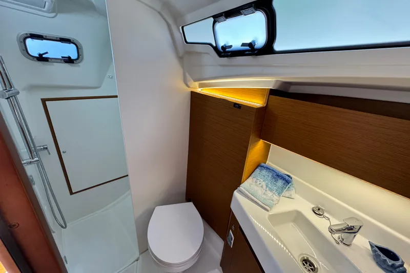 Slide: The Image of Modern bathroom interior of 2025 Jeanneau Sun Odyssey 350 yacht, featuring sleek design and amenities. - 21