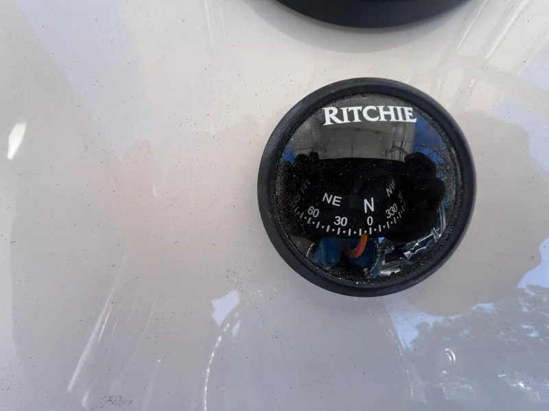 Slide: The Image of Ritchie compass on 2025 Sea Chaser 22 HFC boat dashboard. - 14
