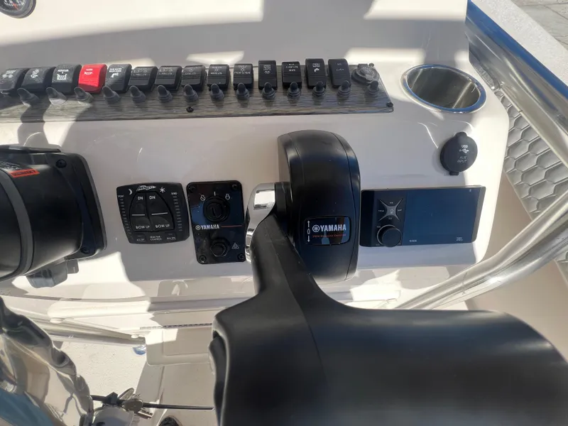 Slide: The Image of Control panel of 2025 Sea Chaser 22 HFC boat with Yamaha throttle. - 18