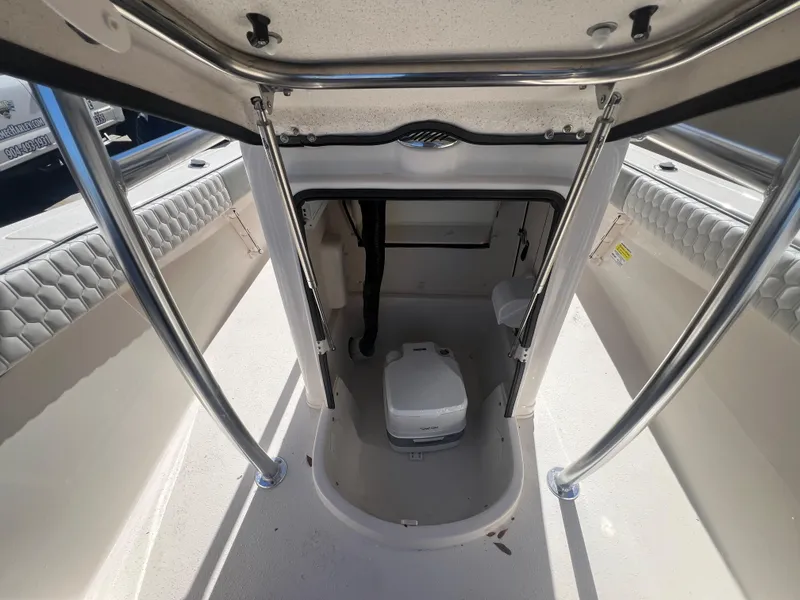Slide: The Image of 2025 Sea Chaser 22 HFC boat interior with compact marine toilet. - 20