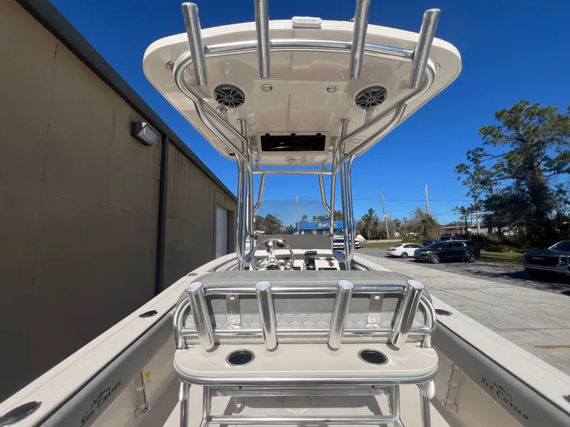 Slide: The Image of 2025 Sea Chaser 22 HFC boat on trailer in sunny outdoor setting. - 3