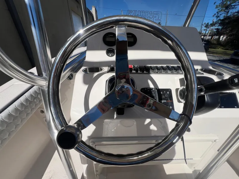 Slide: The Image of 2025 Sea Chaser 22 HFC boat on trailer with Yamaha outboard motor. - 4