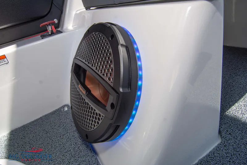 Slide: The Image of 2024 MasterCraft NXT24 boat speaker with blue LED lighting. - 42