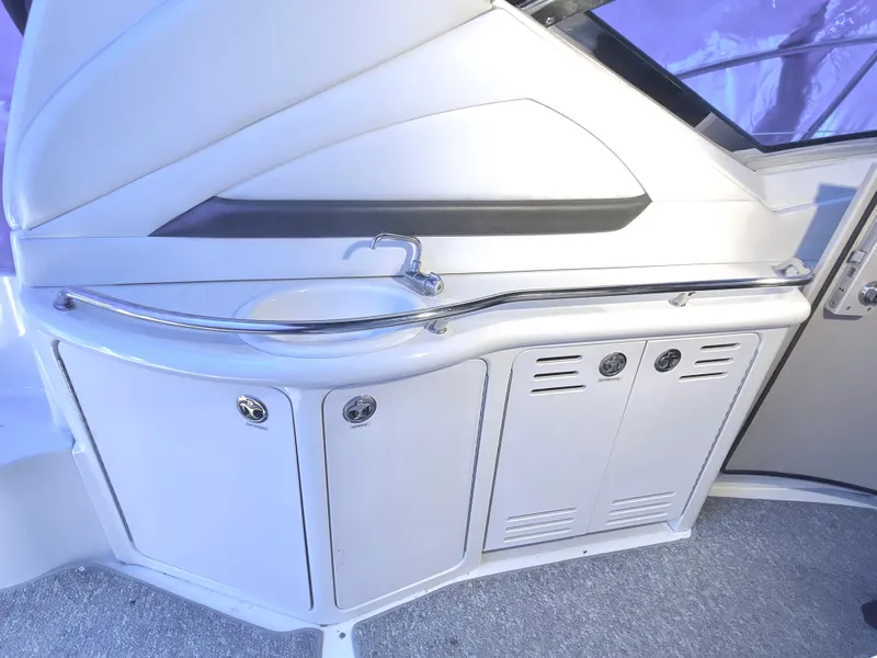 Slide: The Image of 2003 Sea Ray 420 Sundancer yacht interior with sleek cabinetry and modern design. - 11