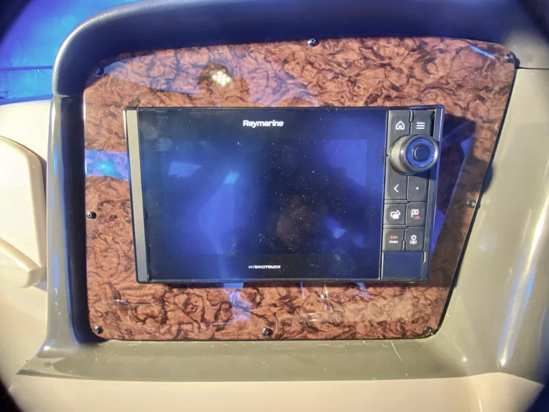 Slide: The Image of Raymarine navigation display on 2003 Sea Ray 420 Sundancer boat dashboard. - 14