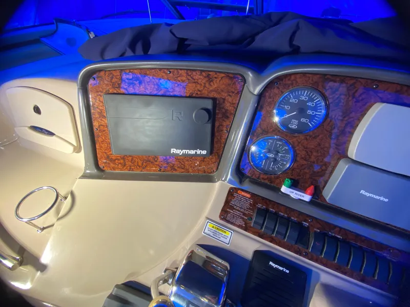 Slide: The Image of Dashboard of 2003 Sea Ray 420 Sundancer with Raymarine navigation system. - 18