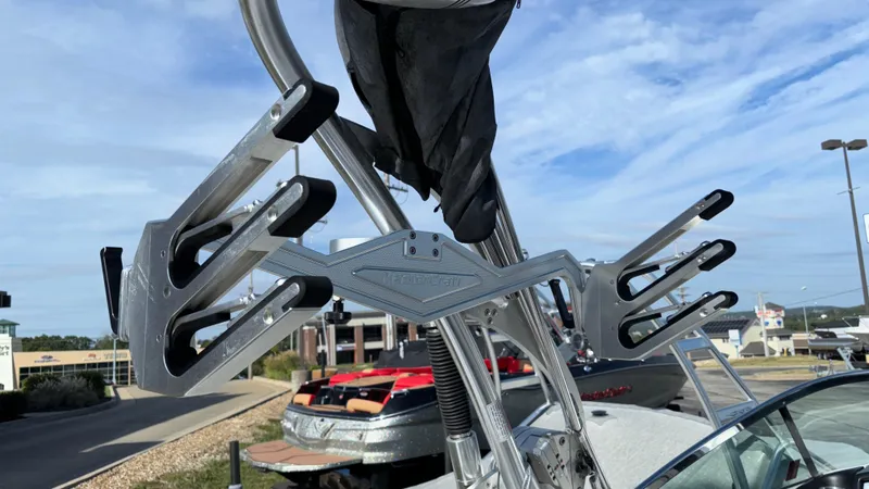 Slide: The Image of 2013 MasterCraft X55 wakeboard tower with board racks. - 25