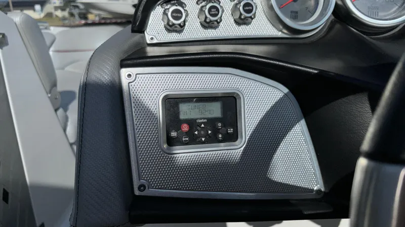 Slide: The Image of Dashboard of 2013 MasterCraft X55 boat with control panel and gauges. - 32