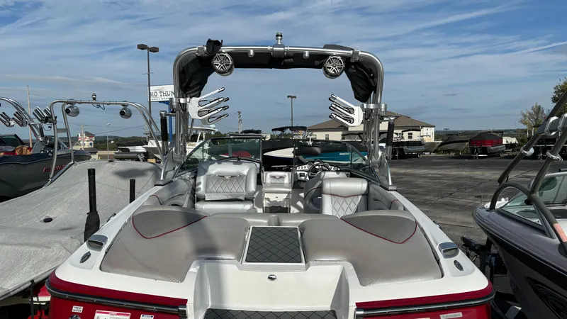 Slide: The Image of 2013 MasterCraft X55 boat with sleek design and spacious seating. - 6