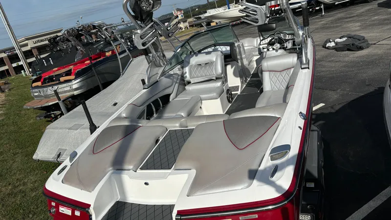 Slide: The Image of 2013 MasterCraft X55 boat with spacious seating and sleek design. - 7