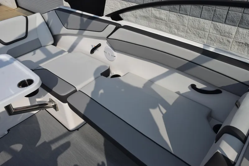 Slide: The Image of 2025 Yamaha Boats AR220 interior seating with modern design and comfortable upholstery. - 10