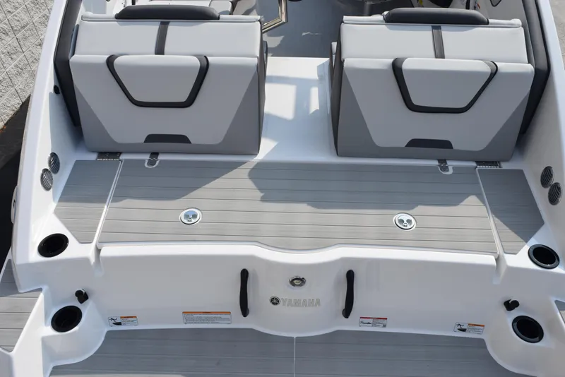 Slide: The Image of 2025 Yamaha Boats AR220 interior with sleek seating and modern design. - 6