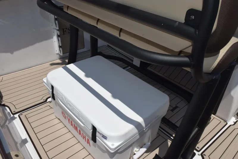 Slide: The Image of 2025 Yamaha Boats 255 FSH Sport E with cooler on deck. - 10