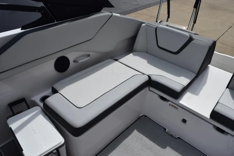 Slide: The Image of 2025 Yamaha AR250 boat interior with sleek, modern seating design. - 12