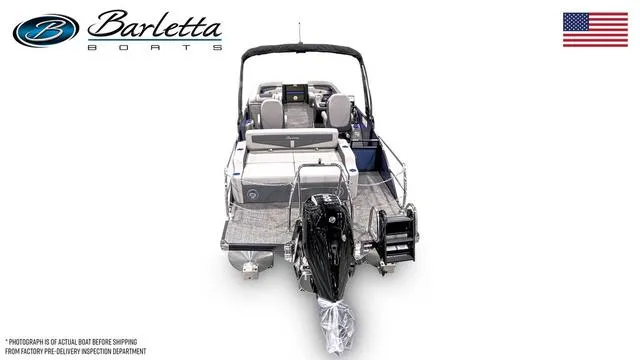 Slide: The Image of 2025 Barletta Cabrio C24UC boat, rear view, featuring sleek design and powerful engine. - 3