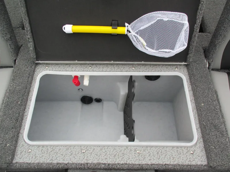 Slide: The Image of 2025 Lund Impact XS 1775 Sport boat storage compartment with fishing net. - 8