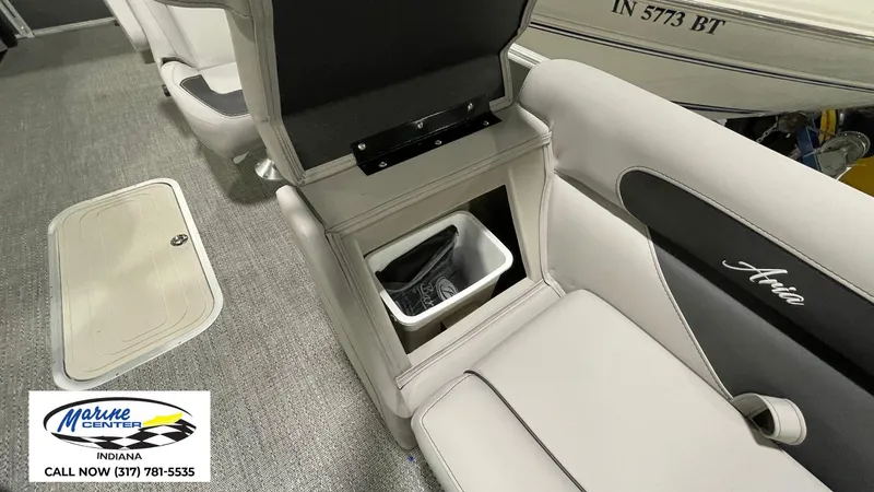 Slide: The Image of 2025 Barletta Aria A22QC boat interior with storage compartment and seating. - 10