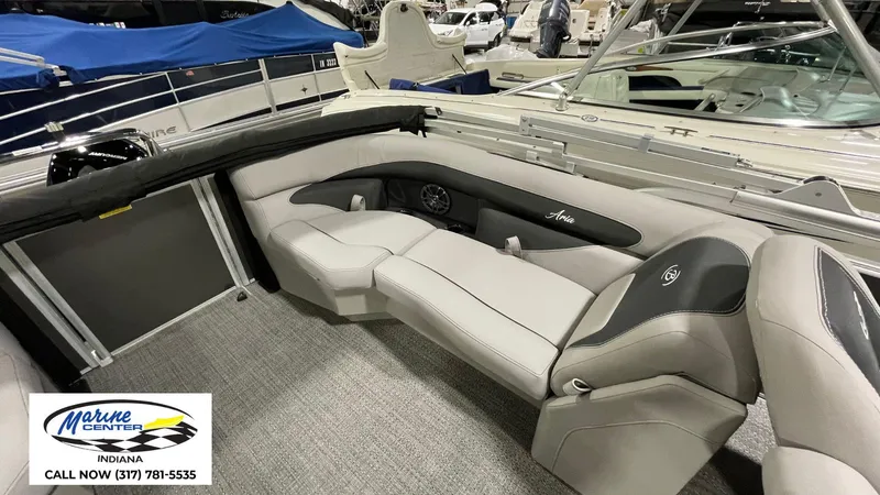 Slide: The Image of 2025 Barletta Aria A22QC boat interior with gray seating at Marine Center Indiana. - 15