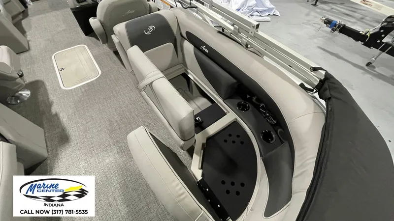 Slide: The Image of 2025 Barletta Aria A22QC pontoon boat interior with seating and cup holders. - 17