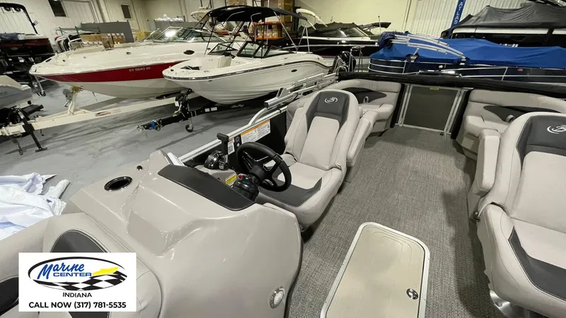 Slide: The Image of 2025 Barletta Aria A22QC pontoon boat interior at Marine Center Indiana showroom. - 21
