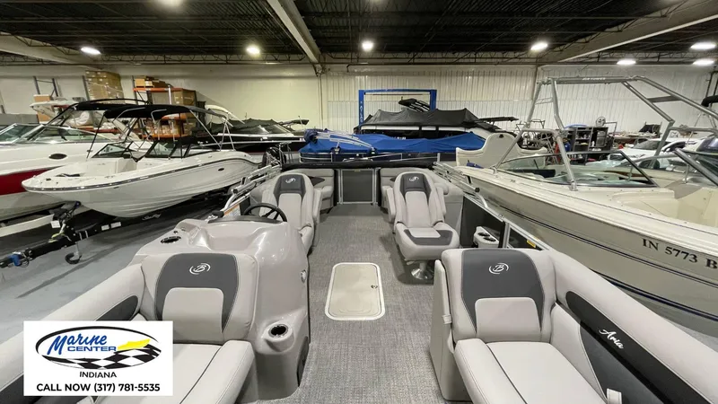 Slide: The Image of 2025 Barletta Aria A22QC pontoon boat in showroom, Marine Center Indiana. - 23