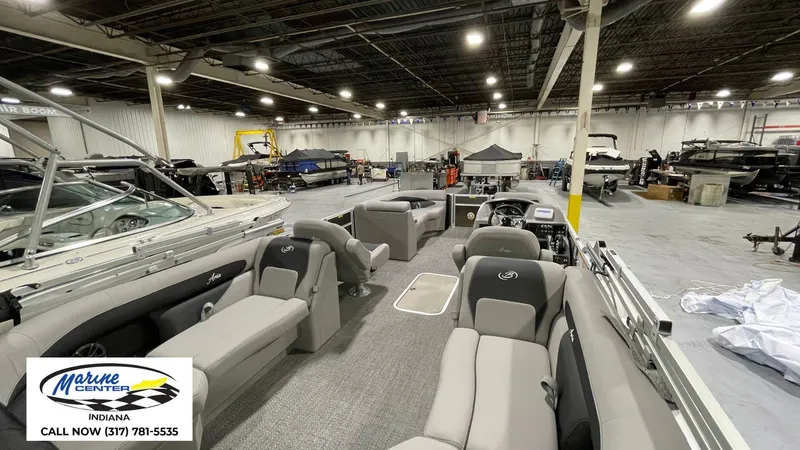 Slide: The Image of 2025 Barletta Aria A22QC pontoon boat in showroom, Marine Center Indiana. - 25