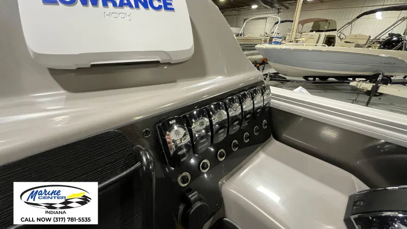 Slide: The Image of 2025 Barletta Aria A22QC boat dashboard with Lowrance Hook system at Indiana Marine Center. - 3