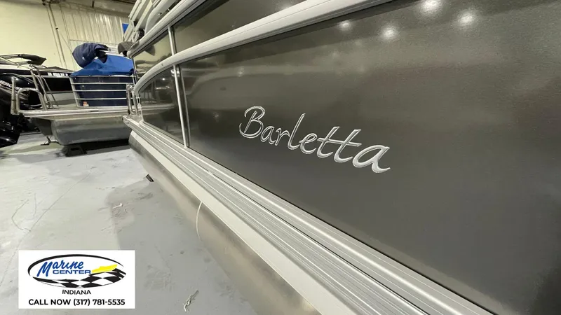 Slide: The Image of 2025 Barletta Aria A22QC pontoon boat at Marine Center Indiana showroom. - 6