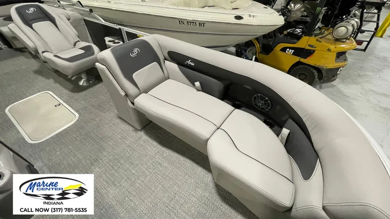 Slide: The Image of 2025 Barletta Aria A22QC boat interior with plush seating and modern design. - 8