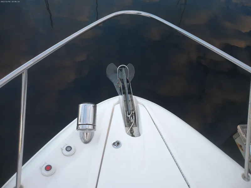 Slide: The Image of Bow view of 2015 Sea Ray 330 Sundancer with anchor and railing. - 36