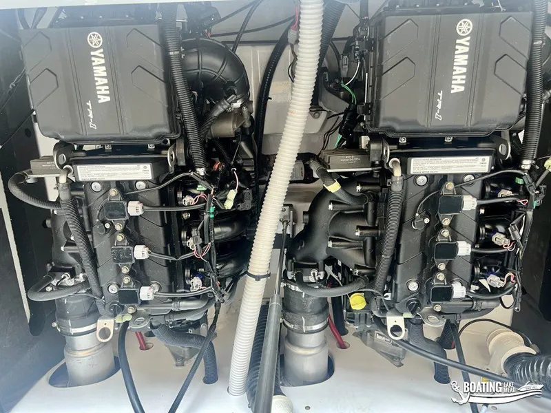 Slide: The Image of 2025 Yamaha AR220 boat engines, detailed view of dual motors and components. - 11