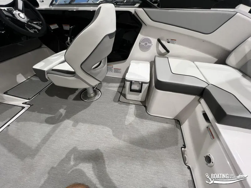 Slide: The Image of 2025 Yamaha Boats AR220 interior with modern seating and sleek design. - 6