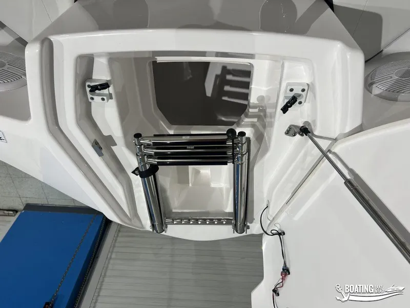 Slide: The Image of 2025 Yamaha AR220 boat ladder and storage compartment, featuring sleek design and functionality. - 7