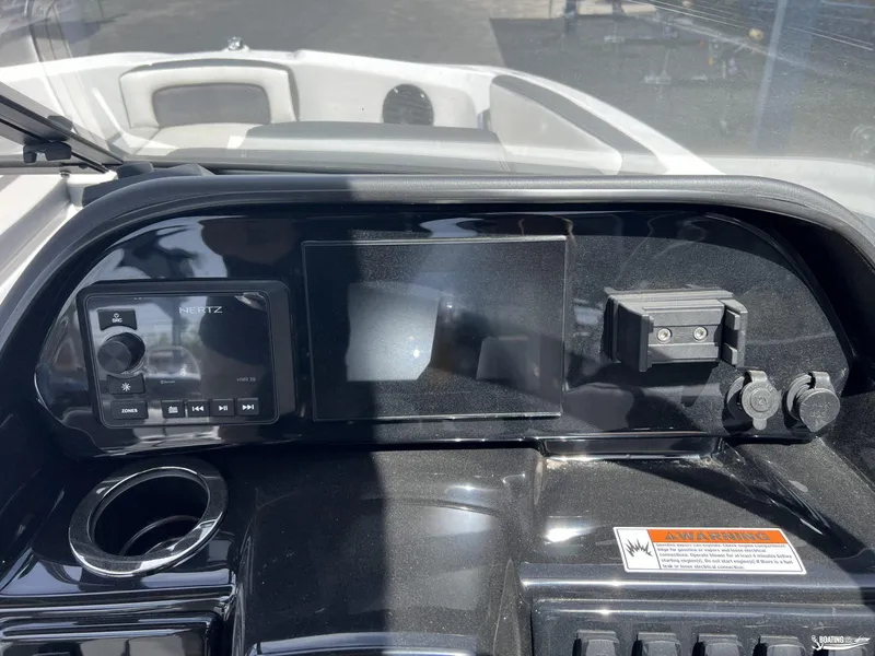 Slide: The Image of Dashboard of a 2025 Yamaha Boats 195S, featuring control panel and display screen. - 11