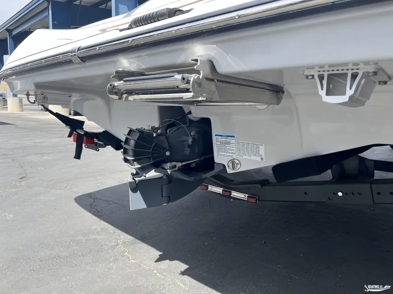 Slide: The Image of 2025 Yamaha Boats 195S rear view showing jet drive and trailer. - 16