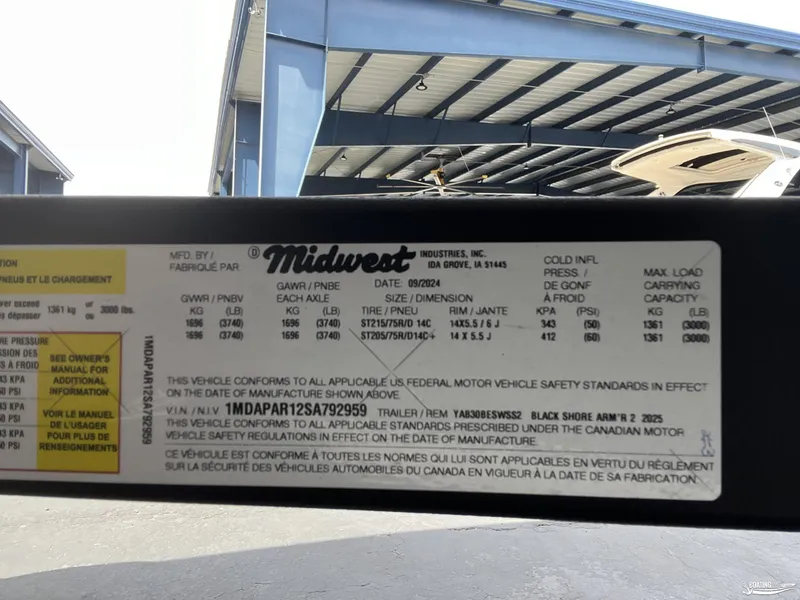 Slide: The Image of Label on Midwest Industries trailer for 2025 Yamaha Boats 195S, showing specifications and safety standards. - 19