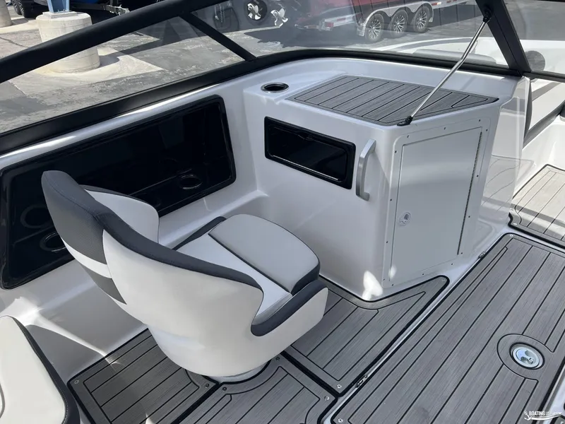 Slide: The Image of 2025 Yamaha Boats 195S interior with sleek seating and modern dashboard design. - 9