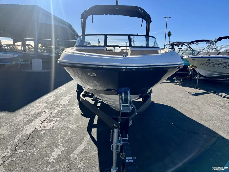 Slide: The Image of 2025 Bayliner VR5 boat on trailer in sunny marina. - 3