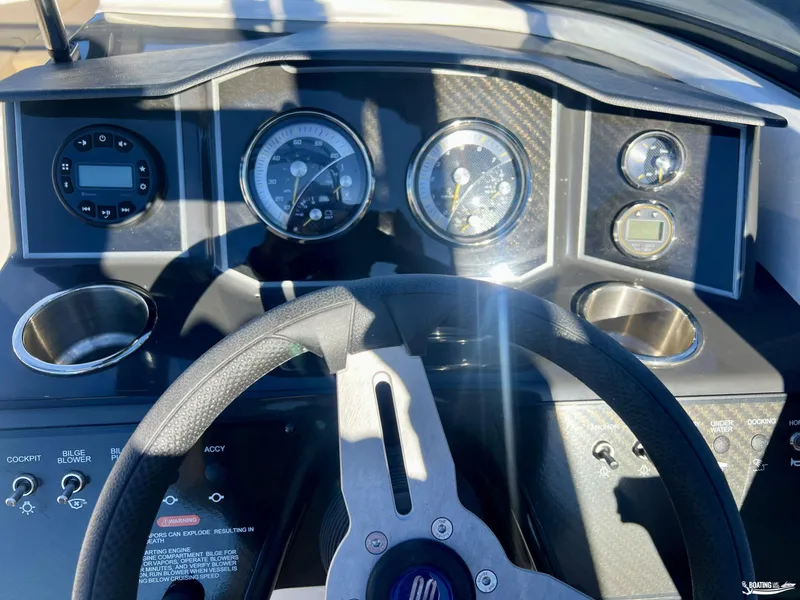 Slide: The Image of 2025 Bayliner VR5 dashboard with steering wheel and instrument panel. - 6