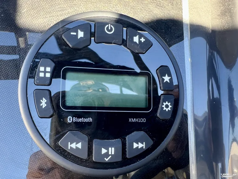 Slide: The Image of Control panel of 2025 Bayliner VR5 boat with Bluetooth and XMH100 display. - 7