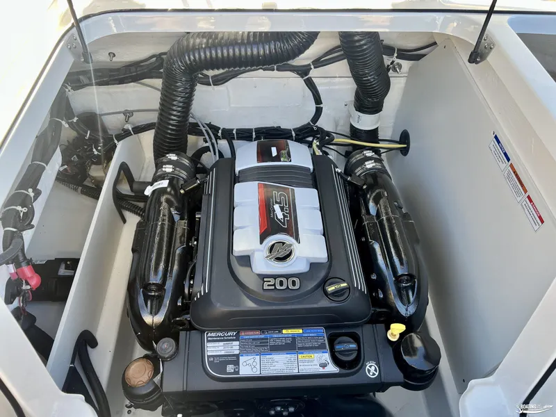 Slide: The Image of 2025 Bayliner VR5 engine compartment with Mercury 4.5L 200 HP engine. - 8