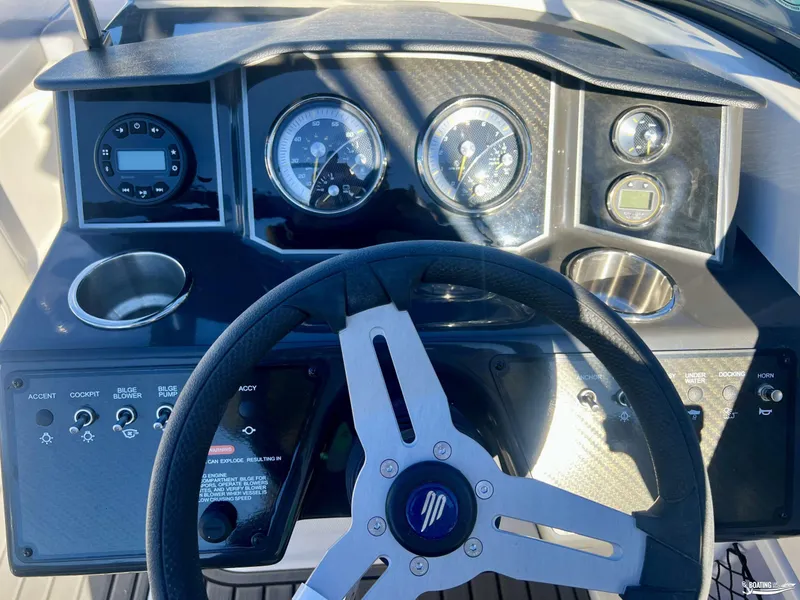 Slide: The Image of 2025 Bayliner VR5 dashboard with steering wheel and instrument panel. - 7