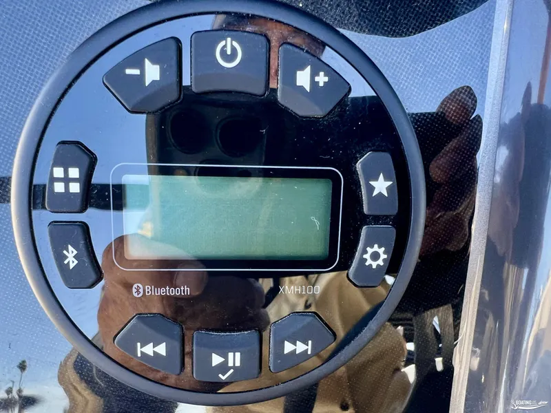 Slide: The Image of Bluetooth control panel on 2025 Bayliner VR5 boat dashboard. - 8
