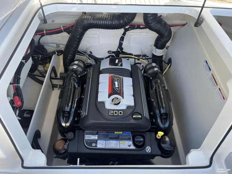 Slide: The Image of 2025 Bayliner VR5 boat engine compartment with Mercury 4.5L 200 HP engine. - 9