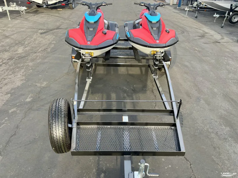 Slide: The Image of 2025 Yamaha WaveRunner Jet Blaster DLX-2 on trailer, parked on asphalt. - 2