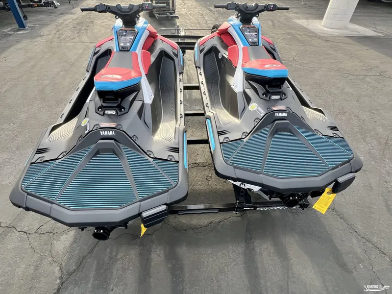 Slide: The Image of 2025 Yamaha WaveRunner Jet Blaster DLX-2, dual units on trailer, vibrant design. - 3