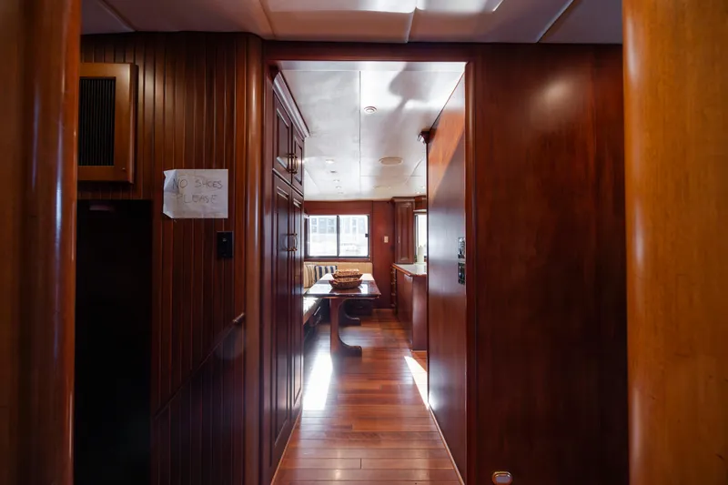 Slide: The Image of Interior of a 1988 Christensen Custom yacht with wooden walls. - 24