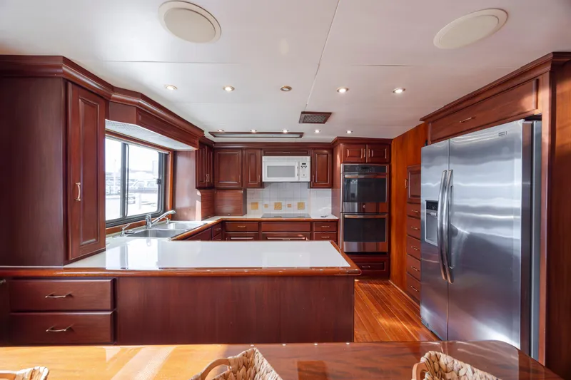 Slide: The Image of Luxurious kitchen on a 1988 Christensen Custom yacht. - 28