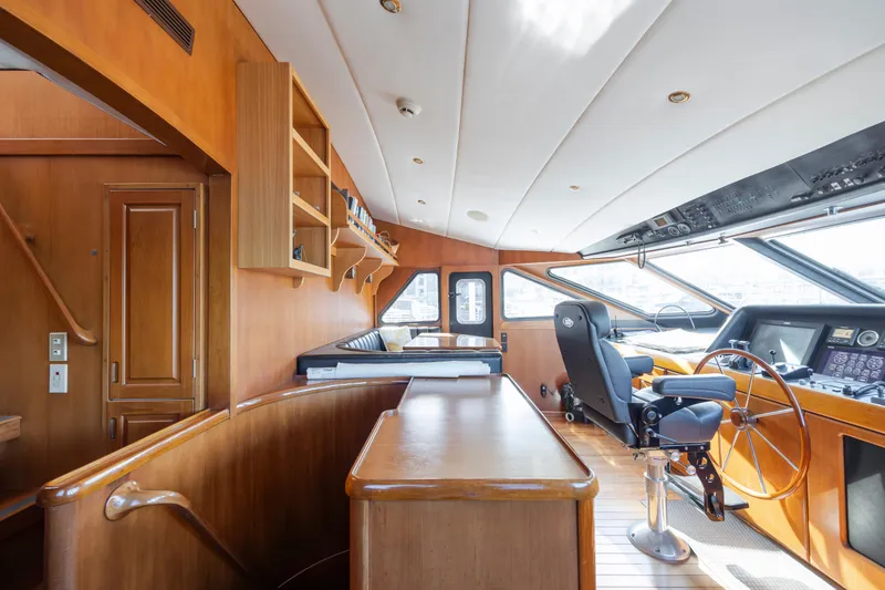 Slide: The Image of Interior of a 1988 Christensen Custom yacht with wood paneling. - 35